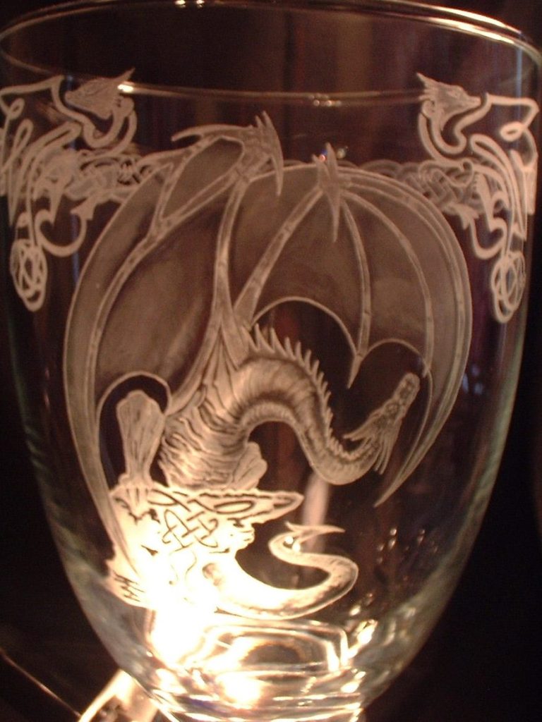 Hand engraved dragon vase.